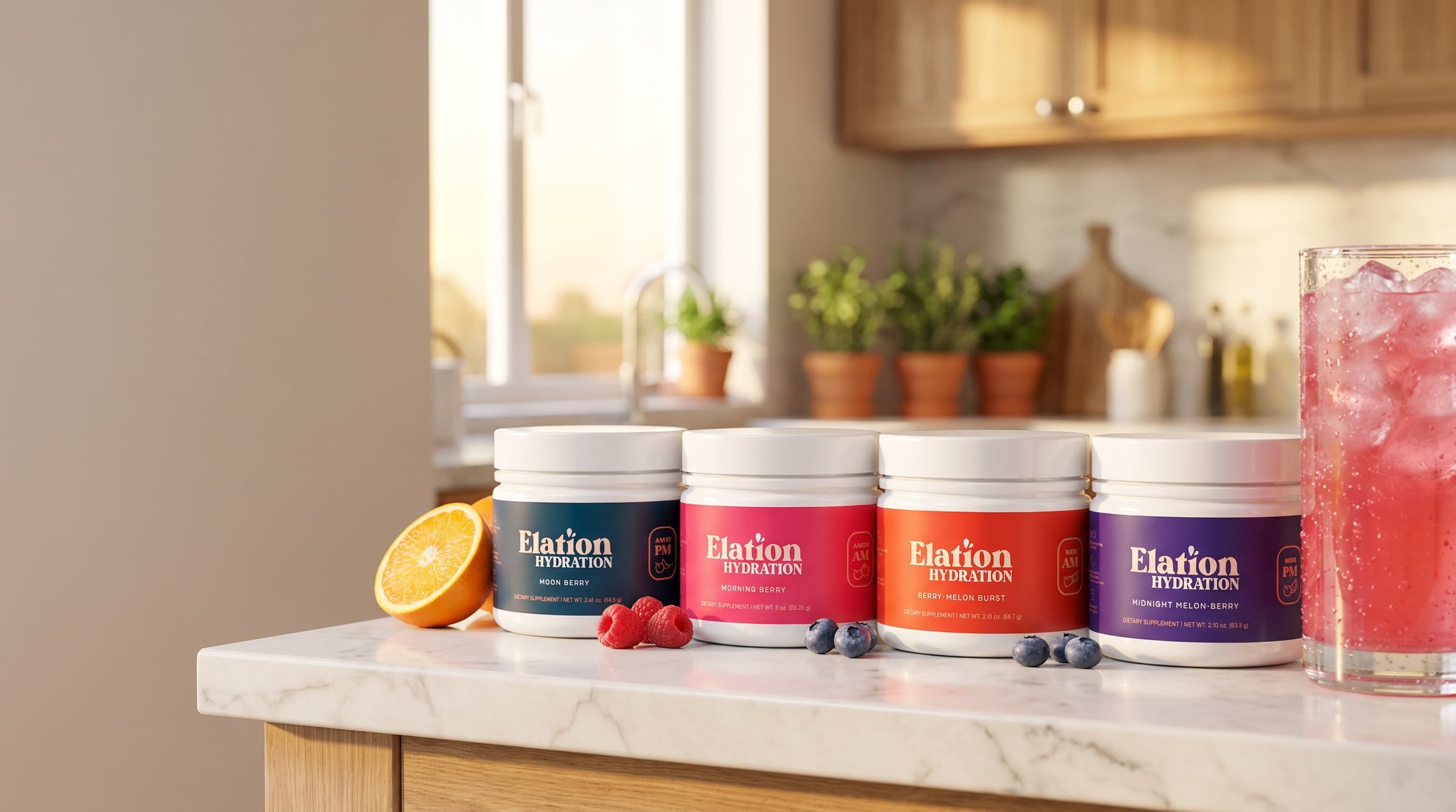 Elation Hydration family of four zero-sugar electrolyte jars on a sunny kitchen counter
